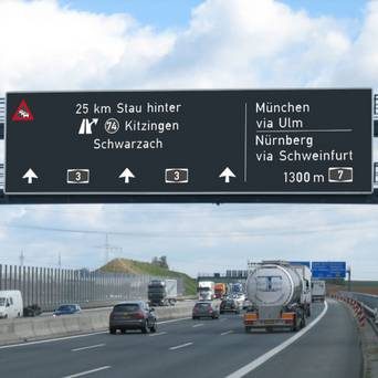 Motorway with electronic traffic guidance signs